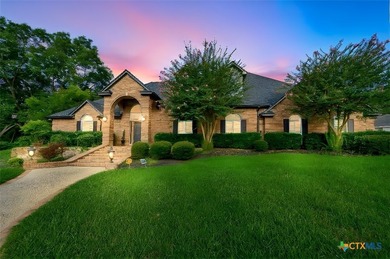 Set on over an acre in a sought-after neighborhood near Lake - photo 1