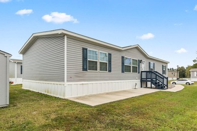 Step inside this beautiful 4-bedroom, 2-bath manufactured home - photo 1