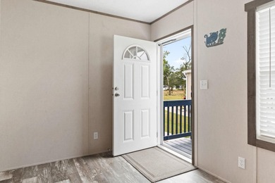 Step inside this beautiful 4-bedroom, 2-bath manufactured home - photo 3