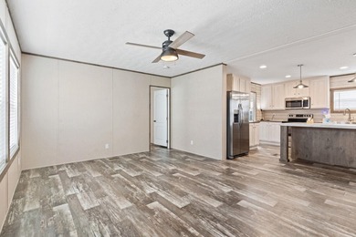 Step inside this beautiful 4-bedroom, 2-bath manufactured home - photo 4