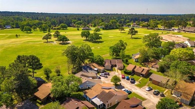 Backs up to the golf course and an easy walk to the clubhouse - photo 4