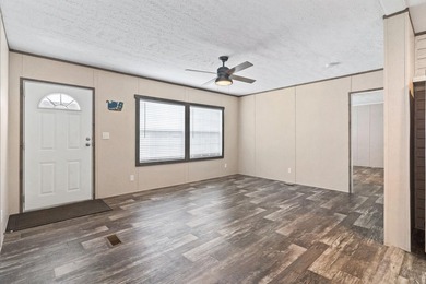 Step inside this beautiful 4-bedroom, 2-bath manufactured home - photo 6