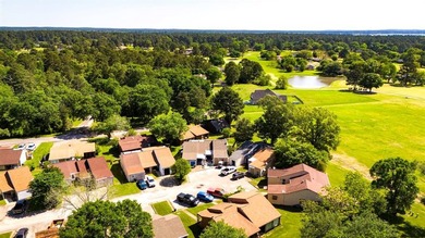 Backs up to the golf course and an easy walk to the clubhouse - photo 6