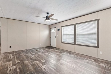 Step inside this beautiful 4-bedroom, 2-bath manufactured home - photo 7