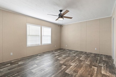 Step inside this beautiful 4-bedroom, 2-bath manufactured home - photo 8