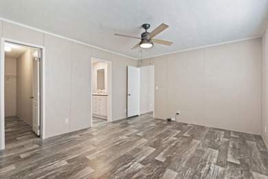 Step inside this beautiful 4-bedroom, 2-bath manufactured home - photo 9