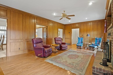 This stunning two-story home is situated on 45 acres in the - photo 8