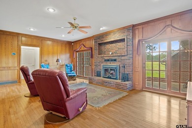 This stunning two-story home is situated on 45 acres in the - photo 9
