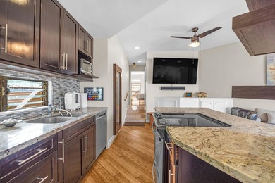 Rarely available and truly special, this beautifully remodeled - photo 8