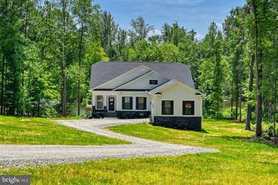 BRAND NEW COMPLETED 5-BEDROOM WATERFRONT HOME INCLUDING A NEW - photo 1
