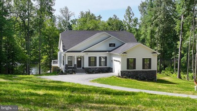 BRAND NEW COMPLETED 5-BEDROOM WATERFRONT HOME INCLUDING A NEW - photo 2