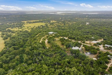 Nestled on over 6 private acres near Canyon Lake, this warm - photo 36