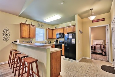 TRANSFERABLE GOLF MEMBERSHIP!! The unit is a 3-bedroom, 2 bath - photo 6
