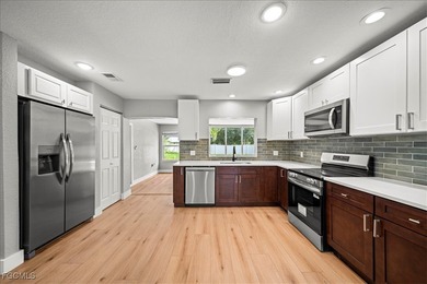 Welcome to this renovated 3 bedroom, 2 bath home tucked away on - photo 8