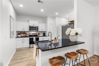 PRICE ADJUSTMENT! Experience easy, stylish living in this - photo 12