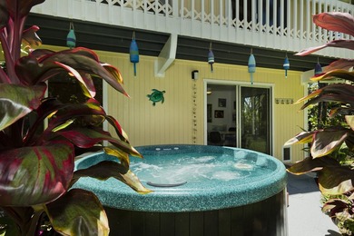 Wake up to sweeping Pacific Ocean views, tropical gardens, and - photo 18