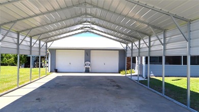 Waterfront -- Situated on an oversized corner canal lot with - photo 3
