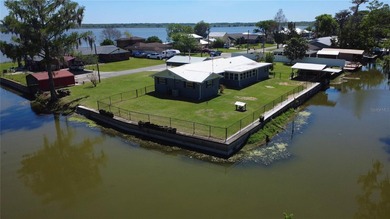 Waterfront -- Situated on an oversized corner canal lot with - photo 4