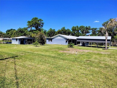 Waterfront -- Situated on an oversized corner canal lot with - photo 6