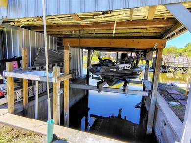 Waterfront -- Situated on an oversized corner canal lot with - photo 8