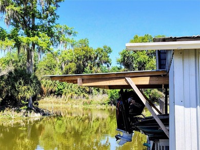 Waterfront -- Situated on an oversized corner canal lot with - photo 10