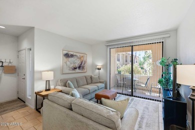 Ideal interior location with south facing patios on the big - photo 5