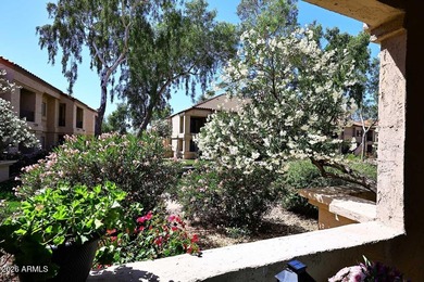Ideal interior location with south facing patios on the big - photo 6