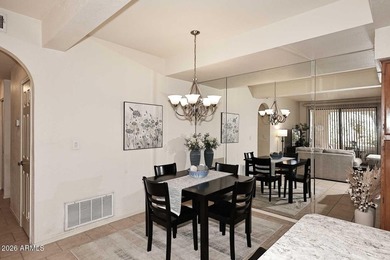 Ideal interior location with south facing patios on the big - photo 7