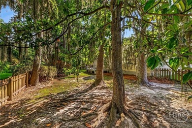 Welcome home to this lovely 4-bedroom, 2-bath residence in the - photo 50
