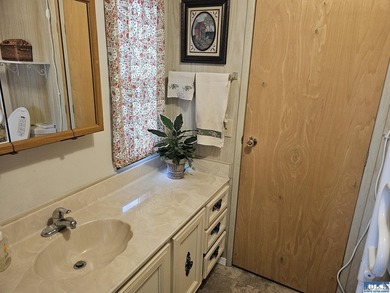 Very well kept home in Juniper Mobile Estates. This home is - photo 15