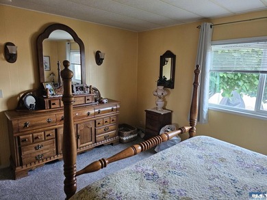 Very well kept home in Juniper Mobile Estates. This home is - photo 18
