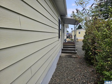 Very well kept home in Juniper Mobile Estates. This home is - photo 23
