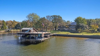 Located on a beautiful 0.87-acre treed lot with 396 feet of - Lake Home For Sale in Mabank, Texas