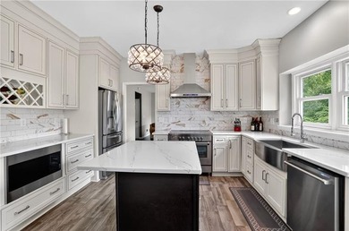 Welcome to 1070 Brockton Close, a beautifully updated 5-bedroom - photo 2