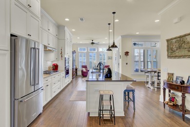 Overlooking the picturesque Frissel Park, this impeccably