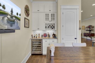 Overlooking the picturesque Frissel Park, this impeccably