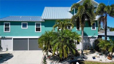 Custom Luxury Island Living! This stunning Matlacha home sits on - photo 3