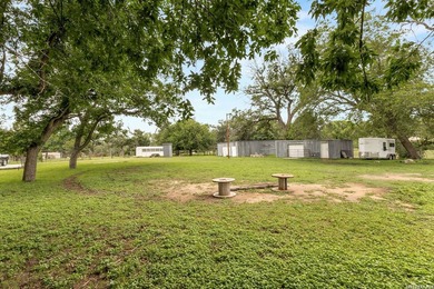 10.5+/- AG-EXEMPT ACRES | GUEST HOUSE | BARNS | ONE STREET FROM - photo 37