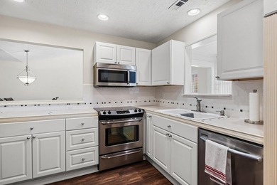 Top Floor with views of the amenities and beautiful landscaping - photo 7