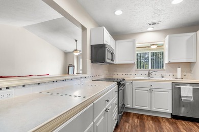 Top Floor with views of the amenities and beautiful landscaping - photo 8