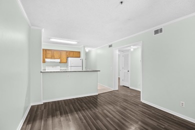 Discover coastal living at its best in Unit 303 at Eagle Lake, a - photo 6
