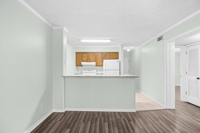 Discover coastal living at its best in Unit 303 at Eagle Lake, a - photo 7