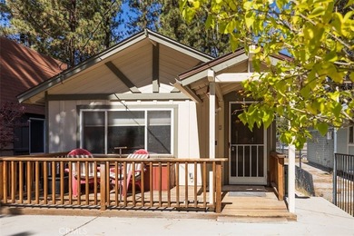 This charming 2-bedroom, 1-bath cabin sits on a quiet street in - photo 1