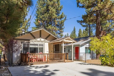 This charming 2-bedroom, 1-bath cabin sits on a quiet street in - photo 2