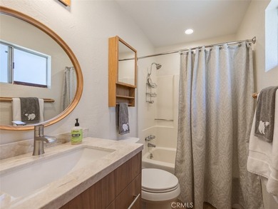 This charming 2-bedroom, 1-bath cabin sits on a quiet street in - photo 7