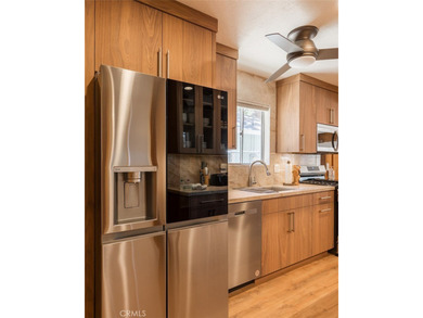 This charming 2-bedroom, 1-bath cabin sits on a quiet street in - photo 9