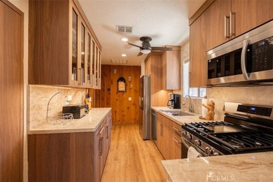 This charming 2-bedroom, 1-bath cabin sits on a quiet street in - photo 10