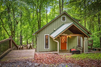 Tucked away on 3.3 acres of private, wooded serenity along 550 - photo 12