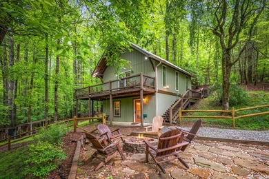 Tucked away on 3.3 acres of private, wooded serenity along 550 - photo 13