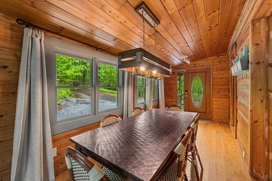 Tucked away on 3.3 acres of private, wooded serenity along 550 - photo 15